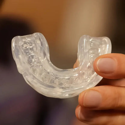 NightShield Dental Mouldable Duelguard held by hand.